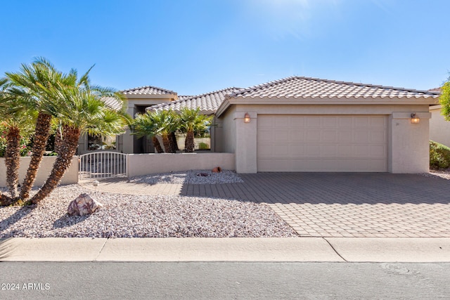 view of front of property featuring a garage