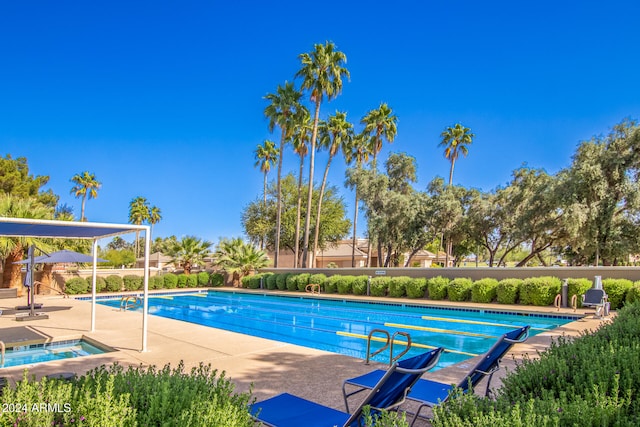 view of pool featuring a patio