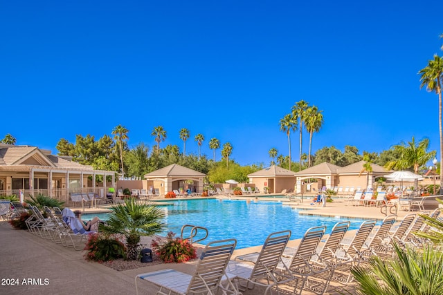 view of swimming pool with a gazebo and a patio