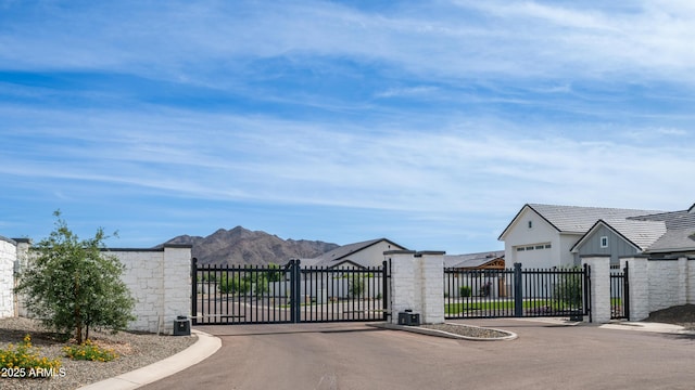 25228 S Star Dr, Queen Creek, AZ 85142 - view of gate featuring a mountain view and fence