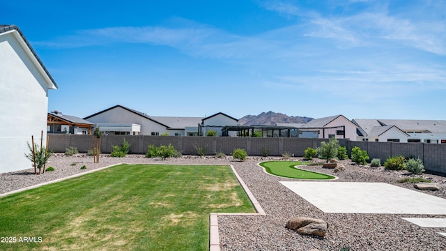 25228 S Star Dr, Queen Creek, AZ 85142 - view of yard featuring a patio area, a residential view, and a fenced backyard