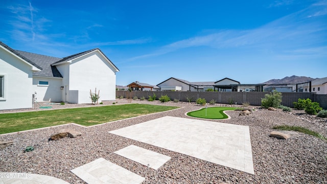 25228 S Star Dr, Queen Creek, AZ 85142 - view of yard featuring a fenced backyard, a patio, and a residential view