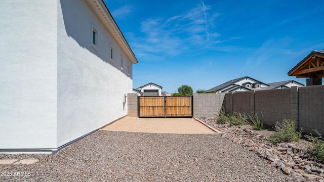 25228 S Star Dr, Queen Creek, AZ 85142 - view of yard with a gate, fence, and a patio