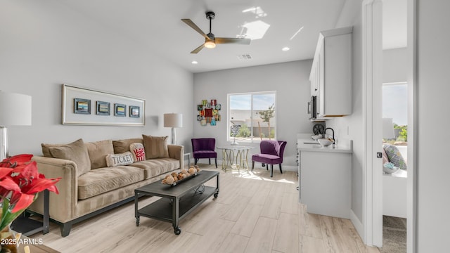 25228 S Star Dr, Queen Creek, AZ 85142 - living room with a skylight, visible vents, recessed lighting, ceiling fan, and baseboards
