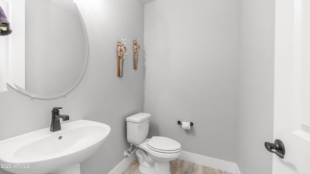 25228 S Star Dr, Queen Creek, AZ 85142 - bathroom featuring a sink, toilet, and baseboards