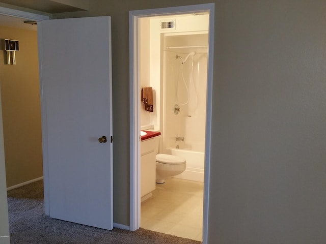 full bathroom with vanity, shower / bath combination, and toilet