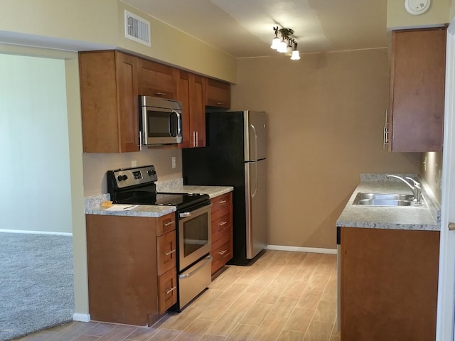 kitchen with stainless steel appliances and sink