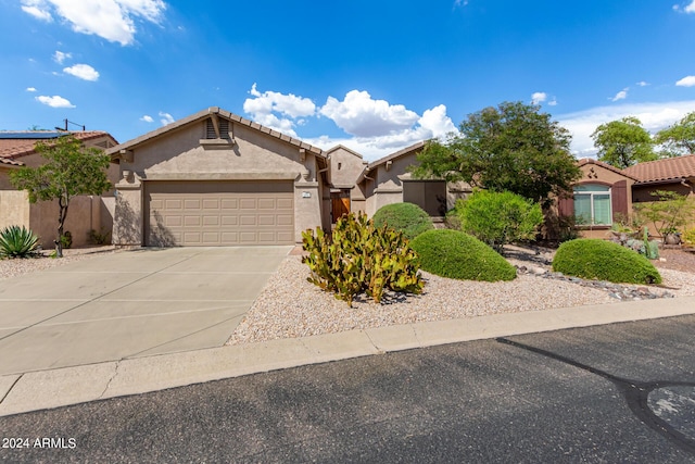 view of front of property featuring a garage