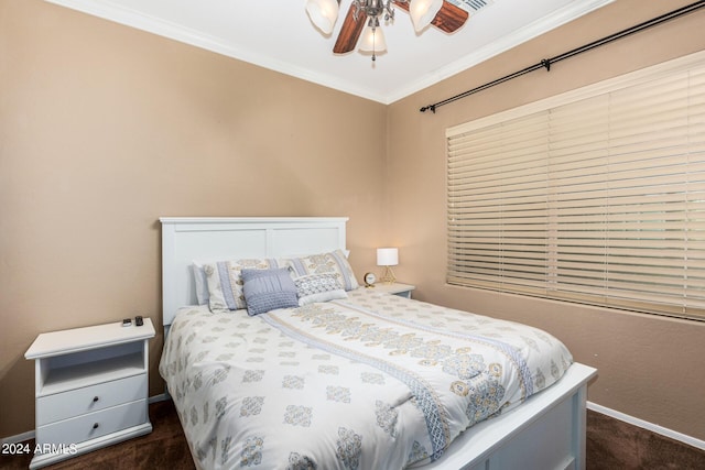 10902 E Silver Mine Rd, Gold Canyon, AZ 85118 - bedroom with dark carpet, ceiling fan, and ornamental molding