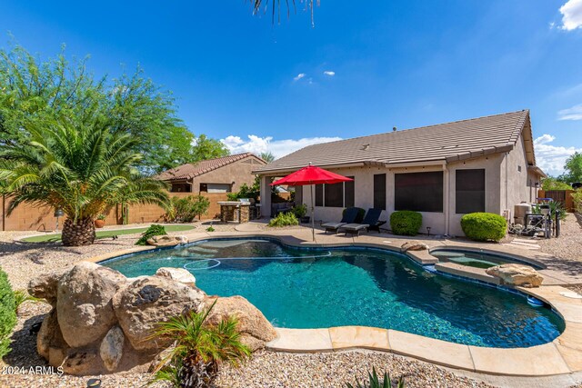10902 E Silver Mine Rd, Gold Canyon, AZ 85118 - view of swimming pool featuring a patio area and an in ground hot tub