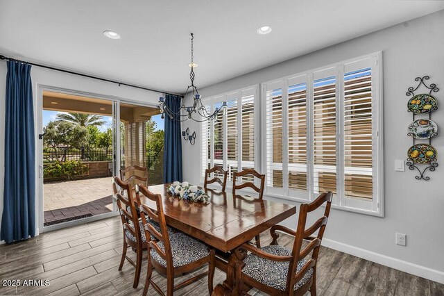 175 E Santa Lucia Ln, Queen Creek, AZ 85140 - dining area featuring wood finished floors, a notable chandelier, baseboards, and recessed lighting