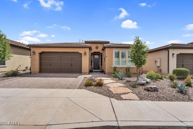 175 E Santa Lucia Ln, Queen Creek, AZ 85140 - view of front of property featuring an attached garage, driveway, stucco siding, and a tile roof