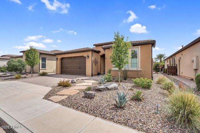 175 E Santa Lucia Ln, Queen Creek, AZ 85140 - view of front of home featuring stucco siding, decorative driveway, an attached garage, and a tile roof