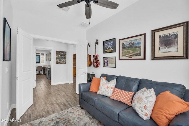 175 E Santa Lucia Ln, Queen Creek, AZ 85140 - living area featuring visible vents, baseboards, a ceiling fan, and wood finished floors