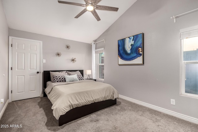 bedroom with light carpet, vaulted ceiling, and ceiling fan