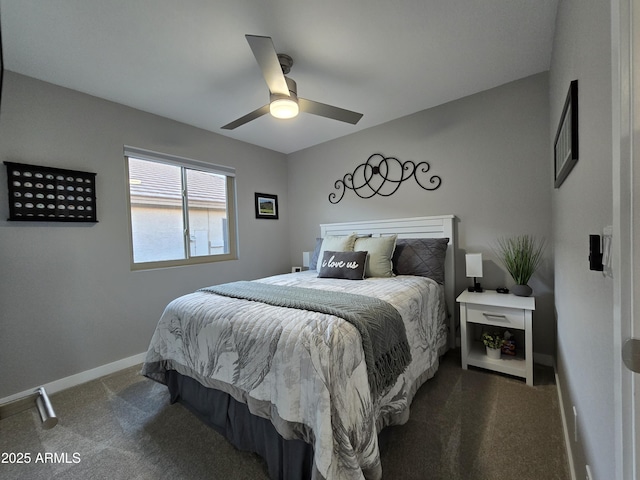 bedroom featuring baseboards, carpet floors, and a ceiling fan