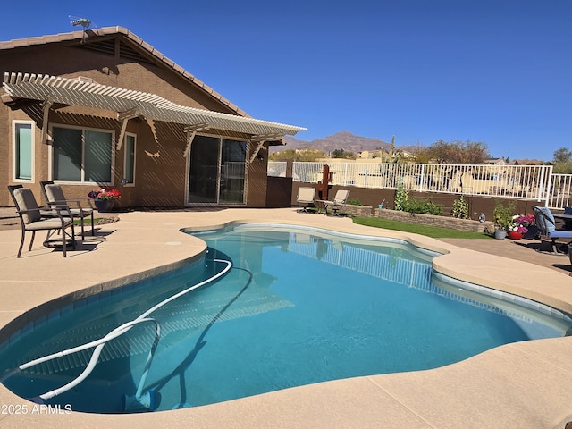 view of pool featuring fence, a patio area, and a pergola