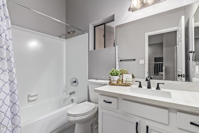 1231 W Mediterranean Dr, Gilbert, AZ 85233 - bathroom featuring vanity, shower / tub combo with curtain, toilet, and a textured wall
