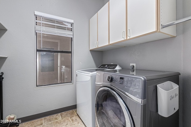 1231 W Mediterranean Dr, Gilbert, AZ 85233 - laundry room featuring washing machine and clothes dryer, cabinet space, and baseboards