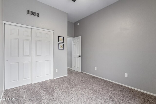 1231 W Mediterranean Dr, Gilbert, AZ 85233 - unfurnished bedroom with carpet, a closet, baseboards, and a ceiling fan