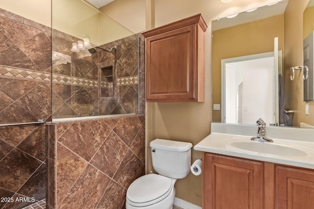 full bath with toilet, walk in shower, and vanity