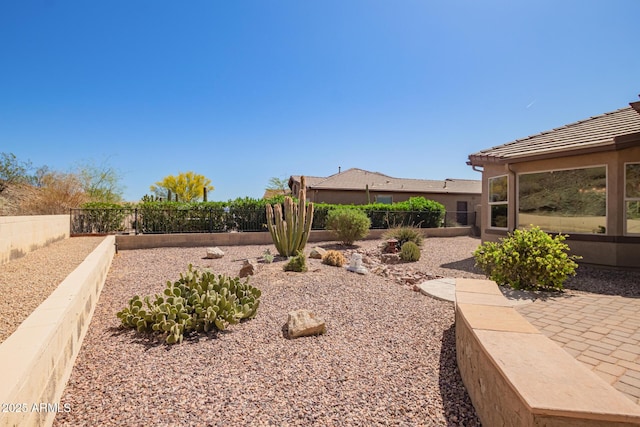 view of yard with a patio and a fenced backyard