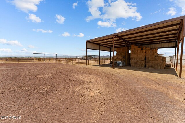 exterior space with a rural view