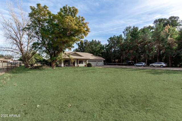 view of yard with a garage