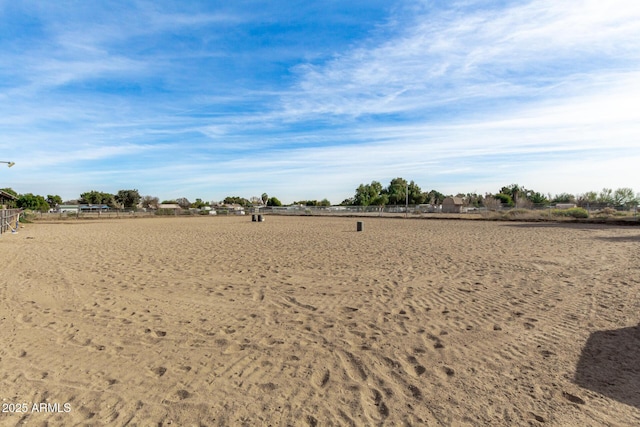 view of yard with a rural view