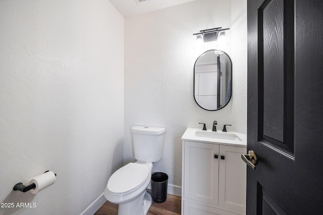 15261 E Golden Eagle Blvd, Fountain Hills, AZ 85268 - half bathroom with vanity and wood finished floors