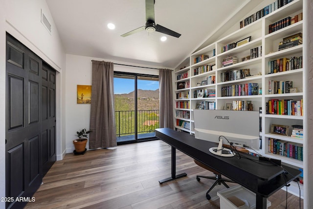 15261 E Golden Eagle Blvd, Fountain Hills, AZ 85268 - office featuring lofted ceiling, a ceiling fan, wood finished floors, built in features, and recessed lighting
