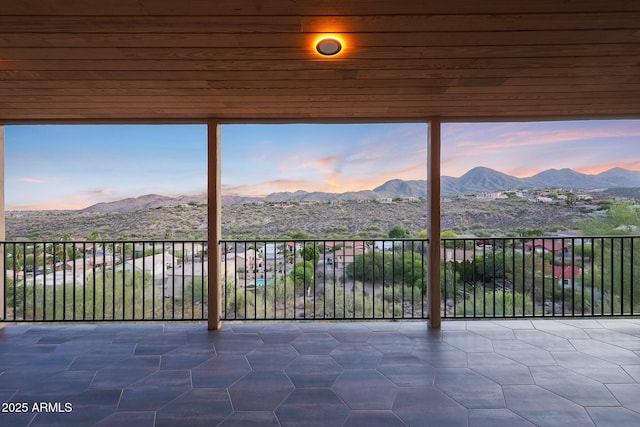 15261 E Golden Eagle Blvd, Fountain Hills, AZ 85268 - unfurnished sunroom featuring a mountain view