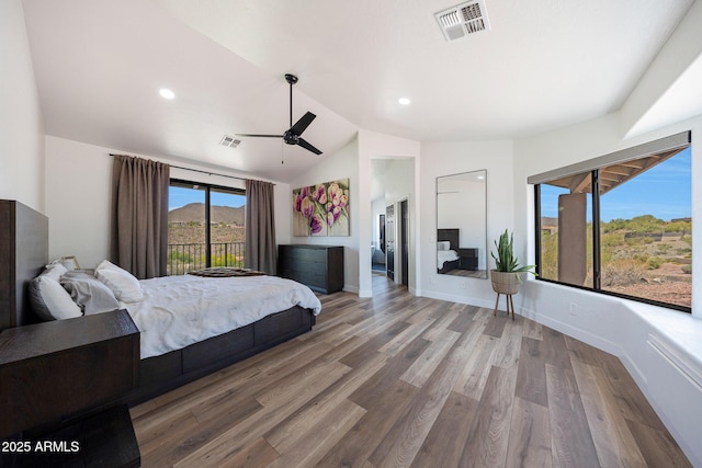 15261 E Golden Eagle Blvd, Fountain Hills, AZ 85268 - bedroom featuring lofted ceiling, wood finished floors, recessed lighting, and ceiling fan