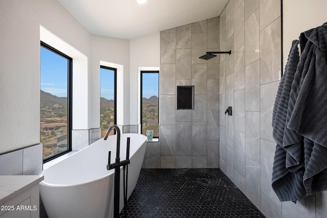 15261 E Golden Eagle Blvd, Fountain Hills, AZ 85268 - bathroom with a freestanding tub, tiled shower, and vanity