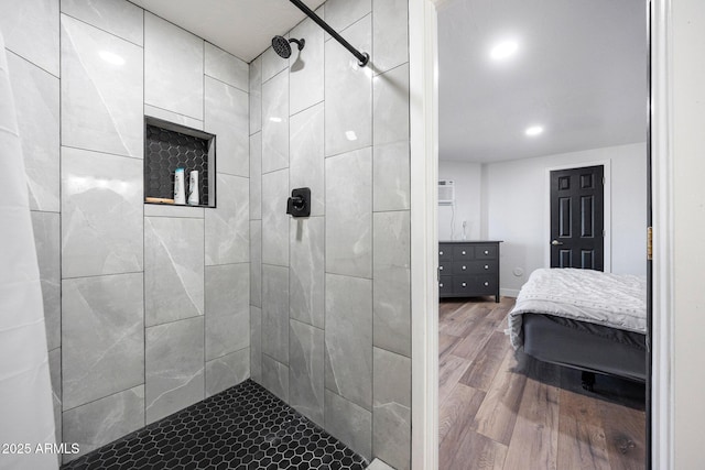 15261 E Golden Eagle Blvd, Fountain Hills, AZ 85268 - bathroom featuring a tile shower, wood finished floors, and recessed lighting