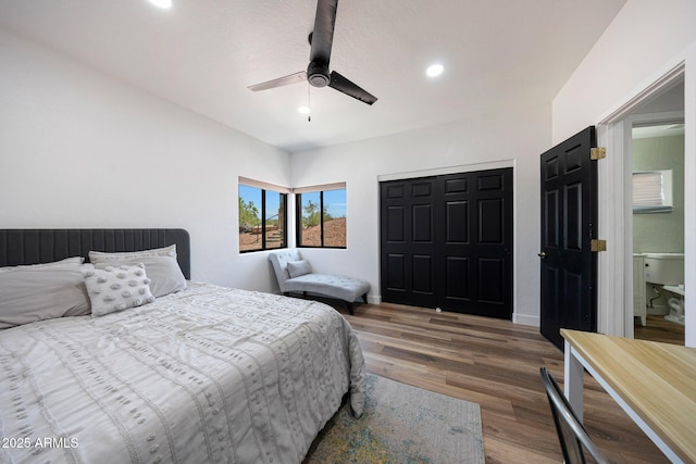 15261 E Golden Eagle Blvd, Fountain Hills, AZ 85268 - bedroom with wood finished floors, recessed lighting, a ceiling fan, and a closet