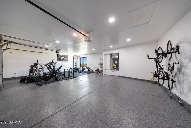 15261 E Golden Eagle Blvd, Fountain Hills, AZ 85268 - exercise room featuring a garage and recessed lighting