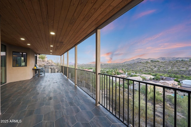 15261 E Golden Eagle Blvd, Fountain Hills, AZ 85268 - balcony at dusk featuring a mountain view