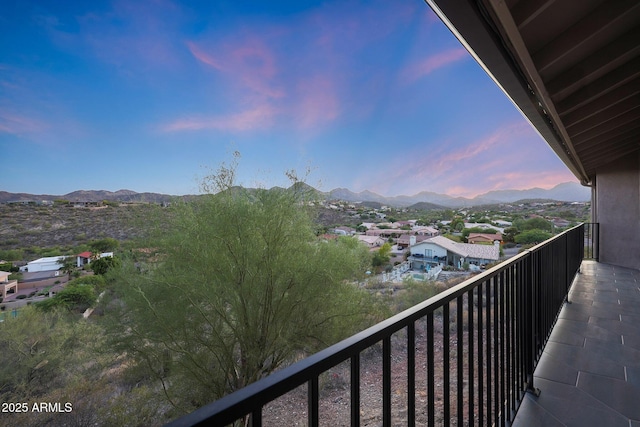 15261 E Golden Eagle Blvd, Fountain Hills, AZ 85268 - balcony at dusk featuring a mountain view