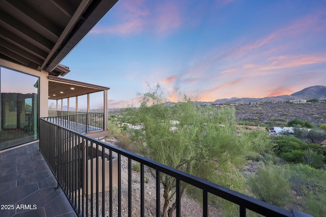 15261 E Golden Eagle Blvd, Fountain Hills, AZ 85268 - balcony at dusk featuring a mountain view