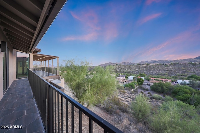 15261 E Golden Eagle Blvd, Fountain Hills, AZ 85268 - balcony at dusk featuring a mountain view
