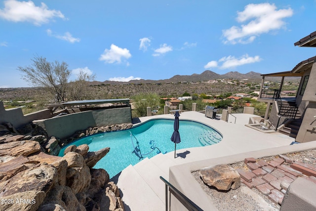 15261 E Golden Eagle Blvd, Fountain Hills, AZ 85268 - view of swimming pool featuring a mountain view, stairs, and a patio area