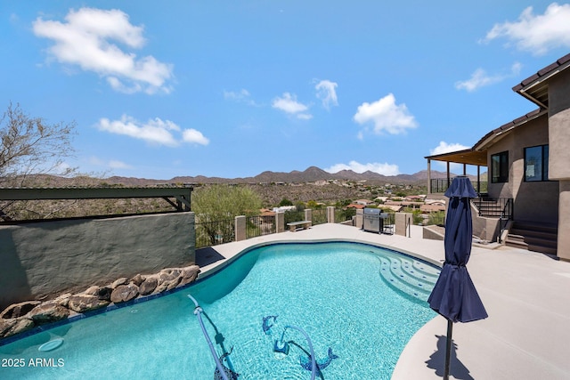 15261 E Golden Eagle Blvd, Fountain Hills, AZ 85268 - view of pool with a mountain view and a patio area