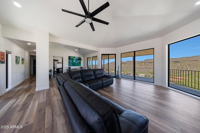 15261 E Golden Eagle Blvd, Fountain Hills, AZ 85268 - living area with a ceiling fan, lofted ceiling, wood finished floors, and recessed lighting