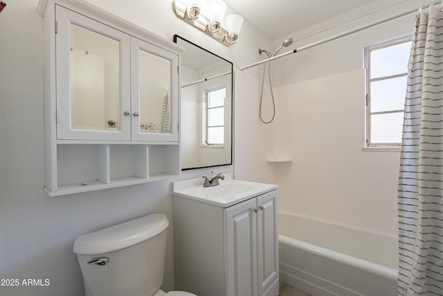 full bathroom with shower / tub combo with curtain, vanity, and toilet