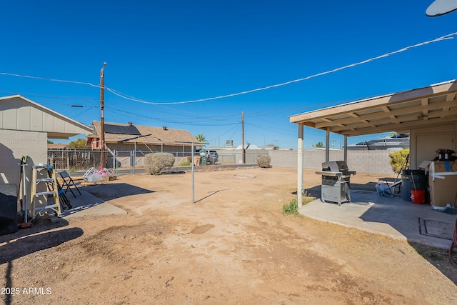 view of yard featuring a patio area and a fenced backyard