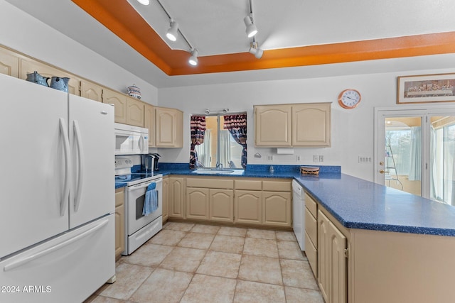 kitchen featuring light brown cabinetry, light tile patterned floors, kitchen peninsula, and white appliances