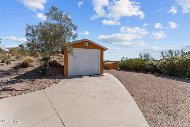 view of outdoor structure with a garage