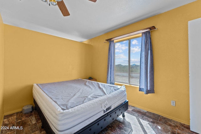 bedroom featuring ceiling fan and billiards