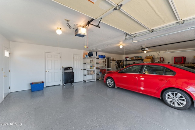 garage featuring a garage door opener